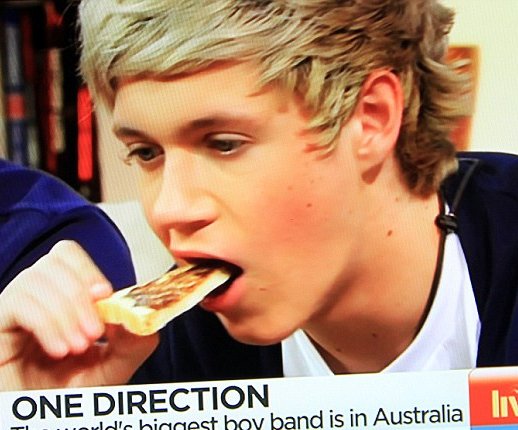 Niall Horan trying Australia's favorite spread Vegemite on a TV show on Channel 7. This was when One Direction was touring Australia.