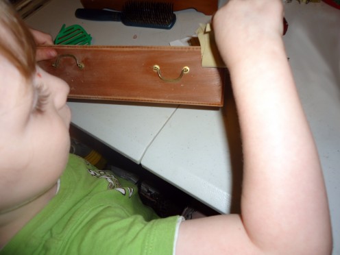 my little boy helping with sanding one of the drawers