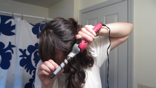 Wrap the hair around the wand in a spiral fashion and hold for a few seconds.