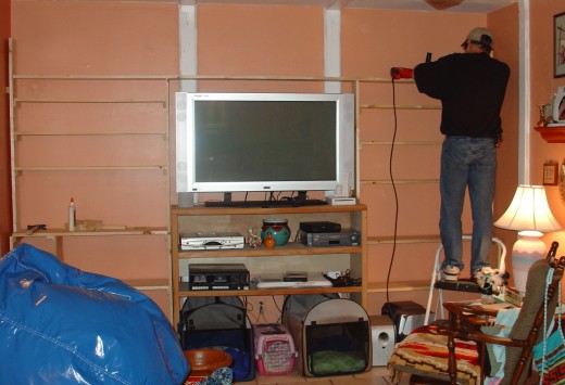 Just fitting the top two shelves on.  This is where the two separate halves become one unit.