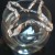 Form a semi-star shape and press points over the lip of the votive cup. Form a semi-star shape and press points over the lip of the votive cup.