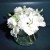 This votive has 10 tiny carnations (about the size of small dianthus) with a few green buds tucked among them. This votive has 10 tiny carnations (about the size of small dianthus) with a few green buds tucked among them.