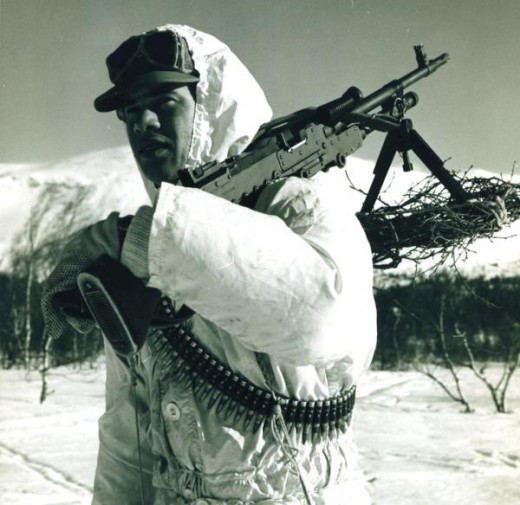 A british solider geared for fighting in the snow.