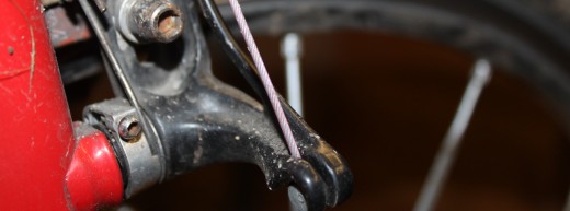 The cable end stop on a set of caliper brakes
