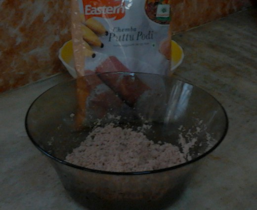 Wet puttu powder using warm water mixed with needed salt to taste