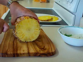 Slice 1/2 fresh pineapple into 1/2 inch slices.