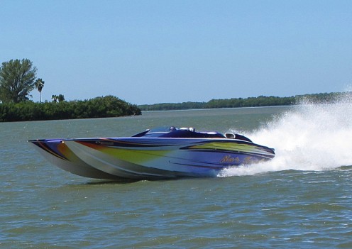 A super boat practices on the Intracoastal Waterway the weekend of the Super Boat Championships. In the background you can see two spoil islands and beyond them Caladesi Island.