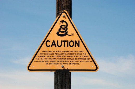 Signs like this warn of rattlers in the area.