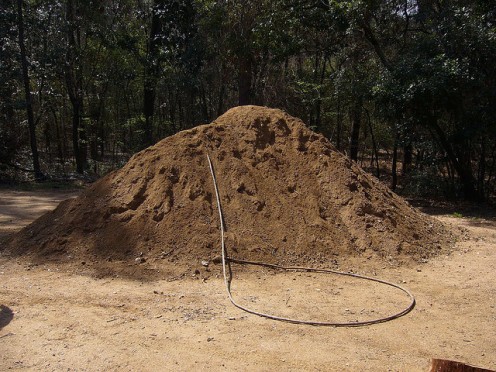 Since I was unable to locate & show you a good photograph of the actual rug, I thought that I could at least show you what a pile of dirt looks like.