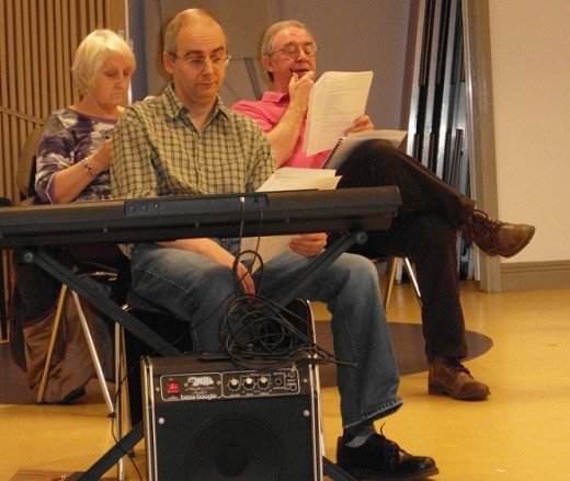 Some of the cast of Devilish Practices in rehearsal