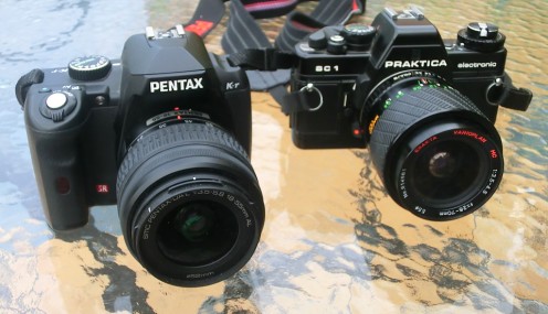 a new Pentax DSLR (2010) and an old Praktica BC-1 SLR camera (1986)