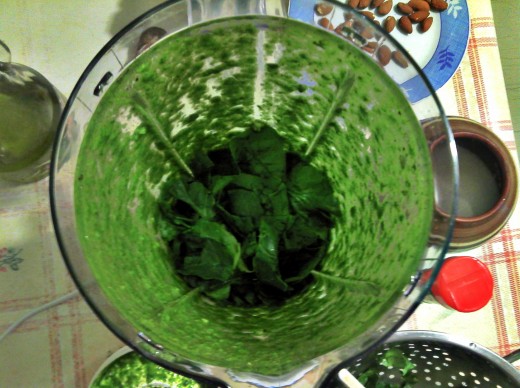 After the first mix,  adding more spinach