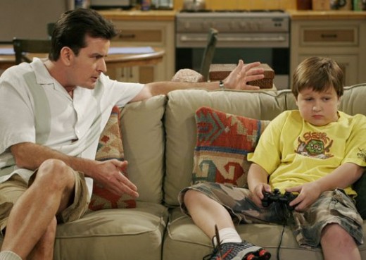 Chalie having a chat with Jake on the TV Show Two and a Half Men Season 3.