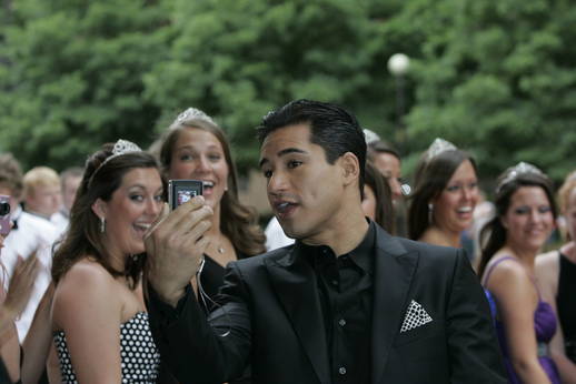 Mario Lopez snaps pics before the Snake Pit Ball