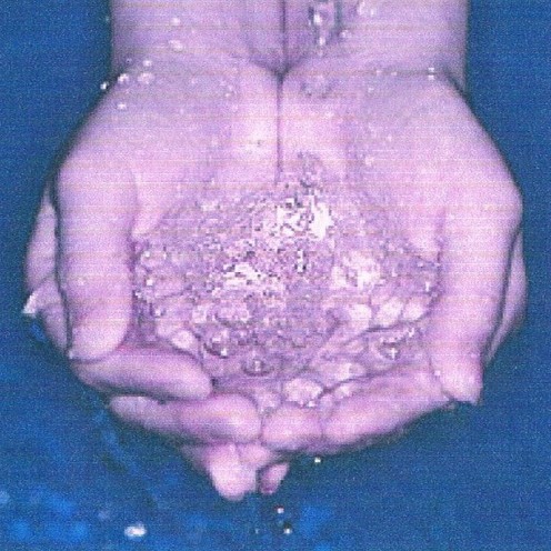 Hands Holding Water