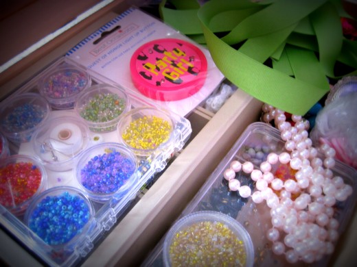 Beads, ribbons and party stuff inside.