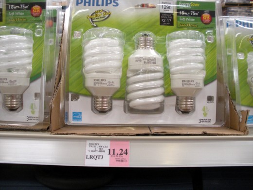 CFL's marked at $11.24 per 3-pack, for a supposed 60 watt equivalency.  Wait!  What?  The lower wattage costs MORE?