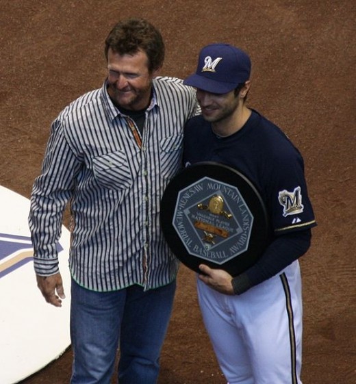 2011 NL MVP Ryan Braun holding the award with former Milwaukee Brewer outfielder Robin Yount