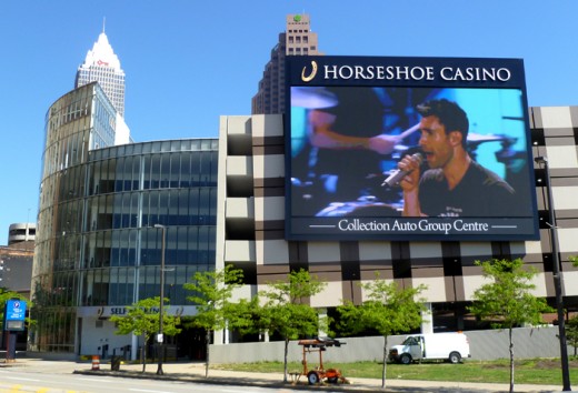 Enter the Gateway North Garage (behind the video board) to self-park, continue on right toward Valet
