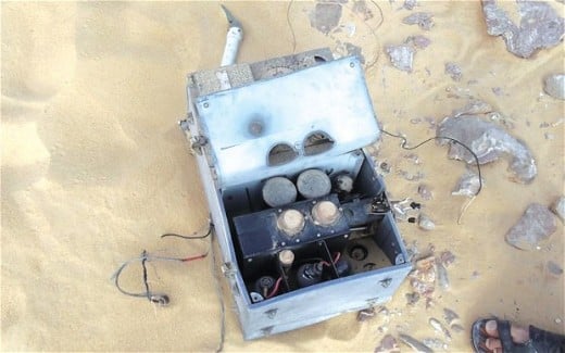 An aircraft radio found near a newly discovered Curtiss Kittyhawk fighter, which vanished over the Sahara in June 1942.  Pilot F/Sgt Dennis Copping, RAF, may have attempted to summon help, but is believed to have perished. 