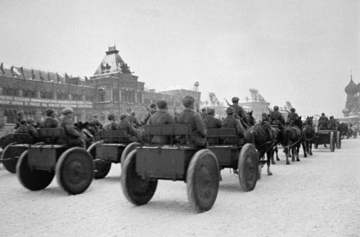 Soviet troops parade in Red Square before being sent to the front line