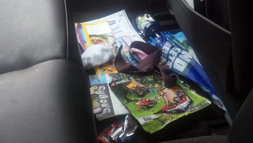 Declutter the floor of your car with an organizer.