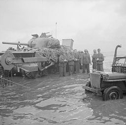  German Prisoners of War await collection by the Allies