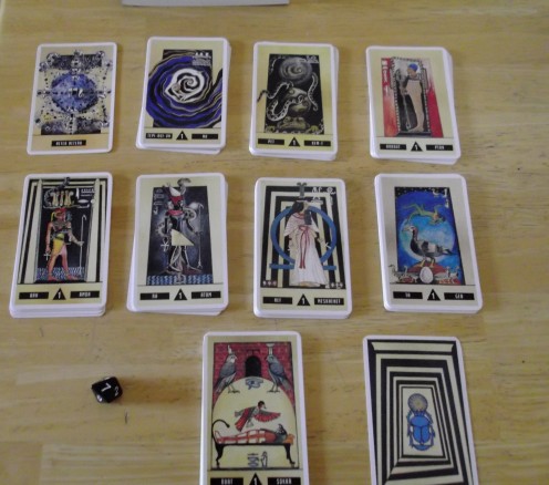 This deck comes with a die and a book to help with the numerology significance of the cards.