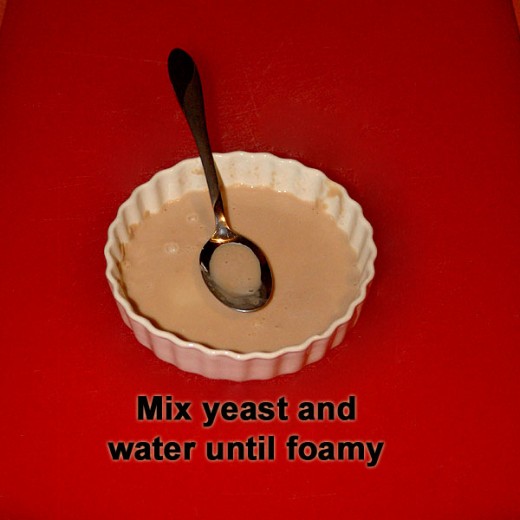 Add water to yeast to activate.