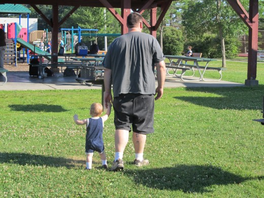 Jacob at 11 months with his 6 ft. tall daddy