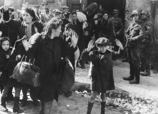 Poland, german soldiers escort a group of polish jewish people. 