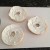 Cover tops of bagels completely with cream cheese.