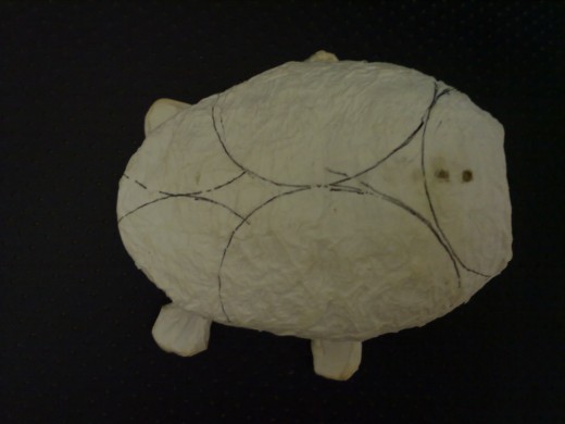 Picture 6: After being layered with thin paper. Look at the position of the holes where you'll hang the head. Picture 6: After being layered with thin paper. Look at the position of the holes where you'll hang the head.