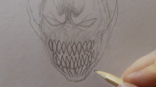 Darken the teeth with a 2B pencil.