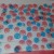 Make red and blue dots on white cardstock paper.