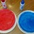 Paint coffee filters red and blue.