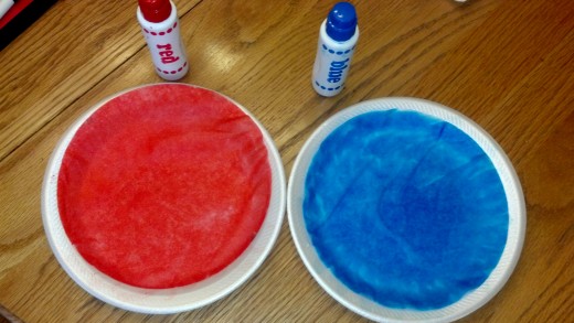Paint coffee filters red and blue.
