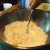 Cutting the margarine into the flour with knife. Cutting the margarine into the flour with knife.