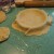Fitting the pie crust into the baking dish. Fitting the pie crust into the baking dish.