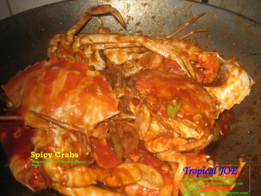Spicy Crabs - cooked in butter, tomato sauce, with julliened carrots, bell peppers and spices