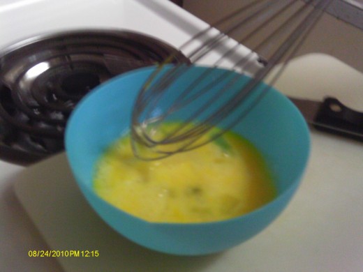 Whisk the eggs with a dash of water or milk.