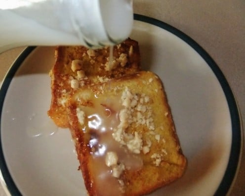 The French Toast is ready to eat when it's golden brown on both sides, and warm.  Pour coconut syrup generously over the top, and enjoy!  Delicious!