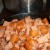 Browning sausage in cast iron skillet while rice cooks.