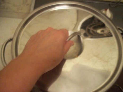 Use extreme caution when removing lid. The steam that will escape can burn or scald skin, eyes etc. 