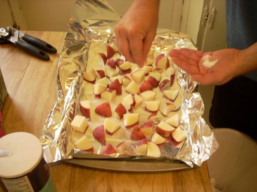 Preparing potatoes for roasting.
