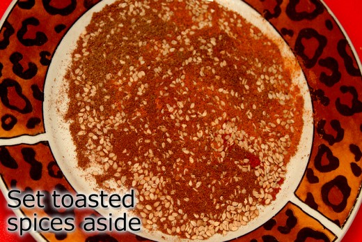 Set the toasted spices to the side and continue with recipe.