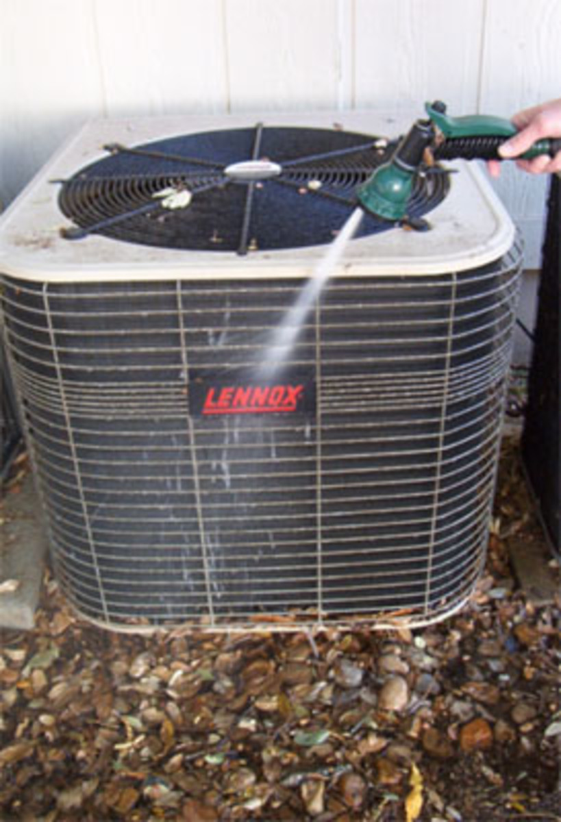 How To Spray Down And Clean A Central Air Conditioner Units Coils Can You Spray An Ac Unit With Water
