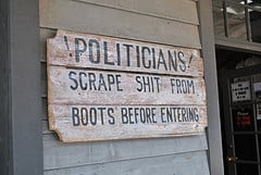 In the 1880's, this was not a joke.  They meant for politicians to actually do it before entering!