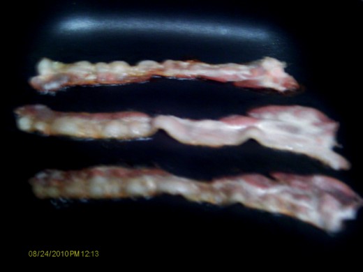 Cook the bacon in a separate pan.