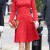 Kate's red dress is designed by Sarah Burton for Alexander McQueen Kate's red dress is designed by Sarah Burton for Alexander McQueen